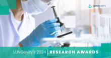 Researcher looking through microscope lungevity awards lung cancer 2024